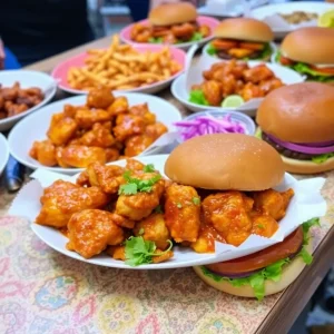 Novi Expands Culinary Offerings with Houston TX Hot Chicken and Shake Shack!